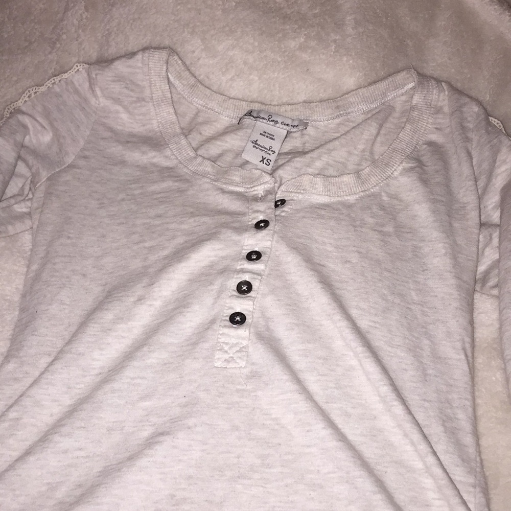 cream color long sleeve shirt